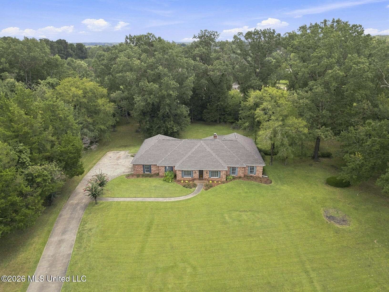 1.5 Acres of Land with Home for Sale in Madison, Mississippi