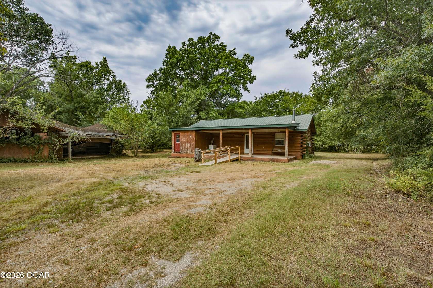 3.28 Acres of Land with Home for Sale in Joplin, Missouri