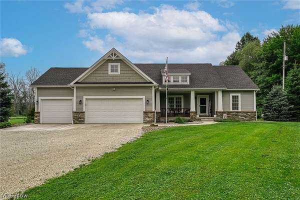 2 Acres of Land with Home for Sale in North Benton, Ohio