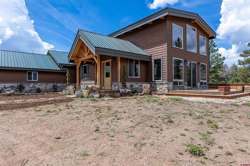 32 Acres of Agricultural Land with Home for Sale in Pagosa Springs, Colorado