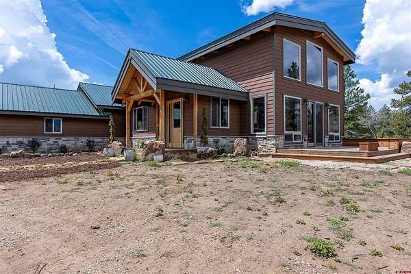 32 Acres of Agricultural Land with Home for Sale in Pagosa Springs, Colorado