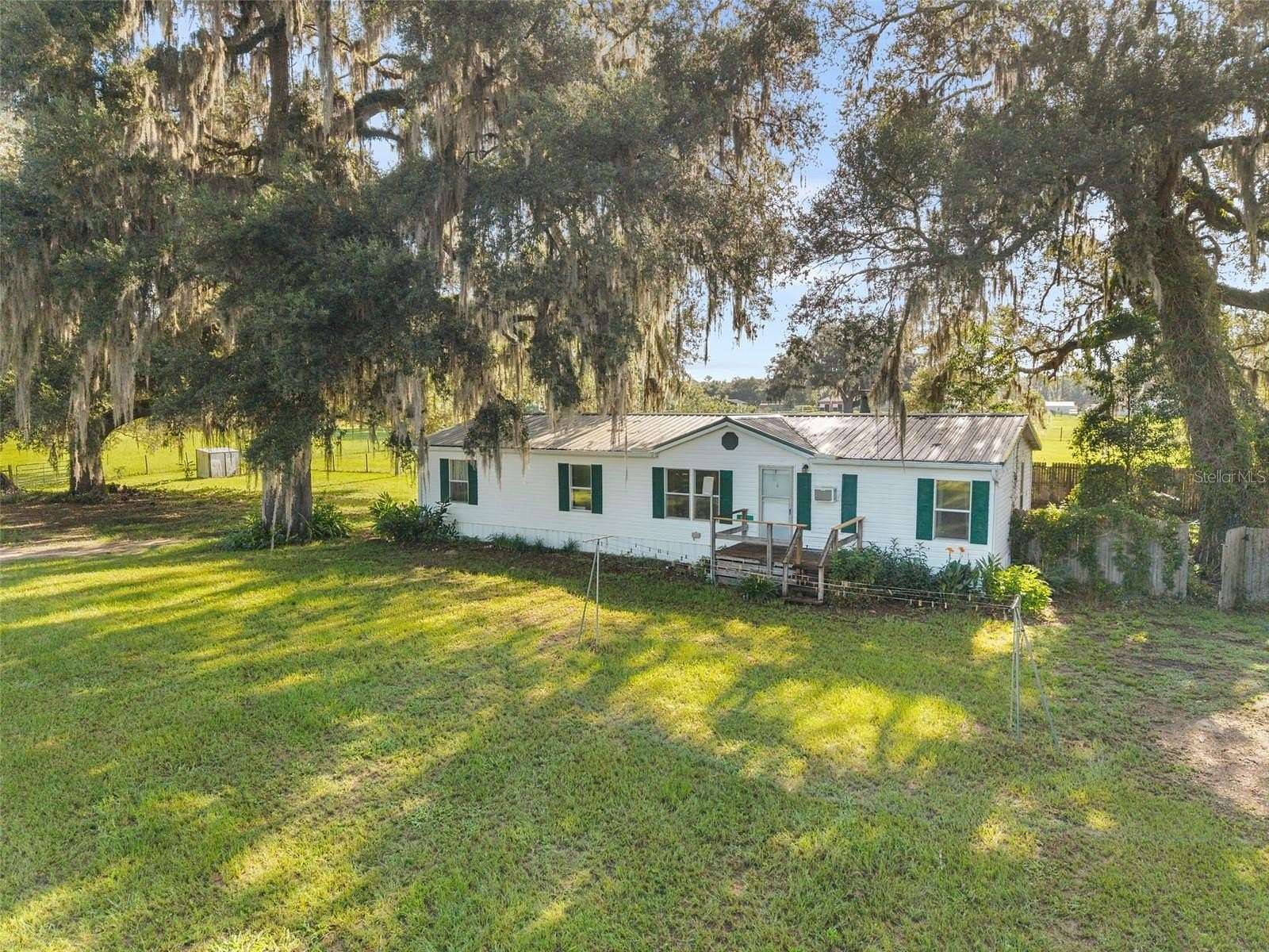 21 Acres of Land with Home for Sale in Trenton, Florida