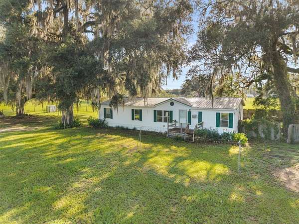 21 Acres of Land with Home for Sale in Trenton, Florida