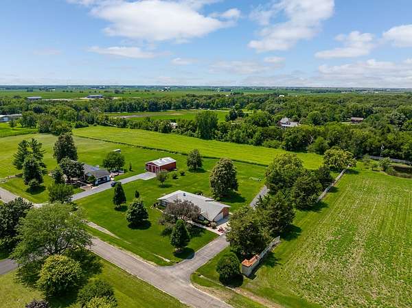 5.5 Acres of Land with Home for Sale in Minooka, Illinois