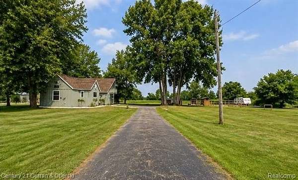 9.73 Acres of Land with Home for Sale in Huron Township, Michigan