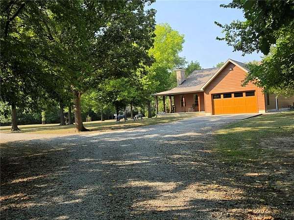 160 Acres of Recreational Land with Home for Sale in Pittsburg, Kansas