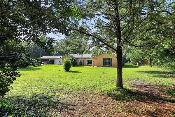 8.69 Acres of Land with Home for Sale in Bonifay, Florida