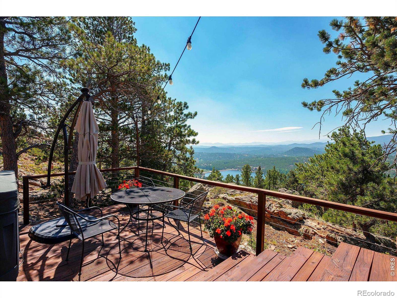 4.37 Acres of Land with Home for Sale in Red Feather Lakes, Colorado