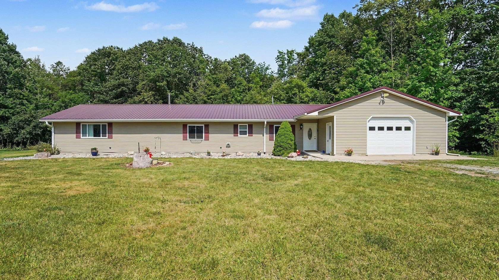 20 Acres of Recreational Land with Home for Sale in Barryton, Michigan
