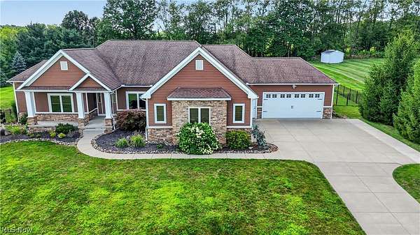 1.52 Acres of Land with Home for Sale in Norton, Ohio