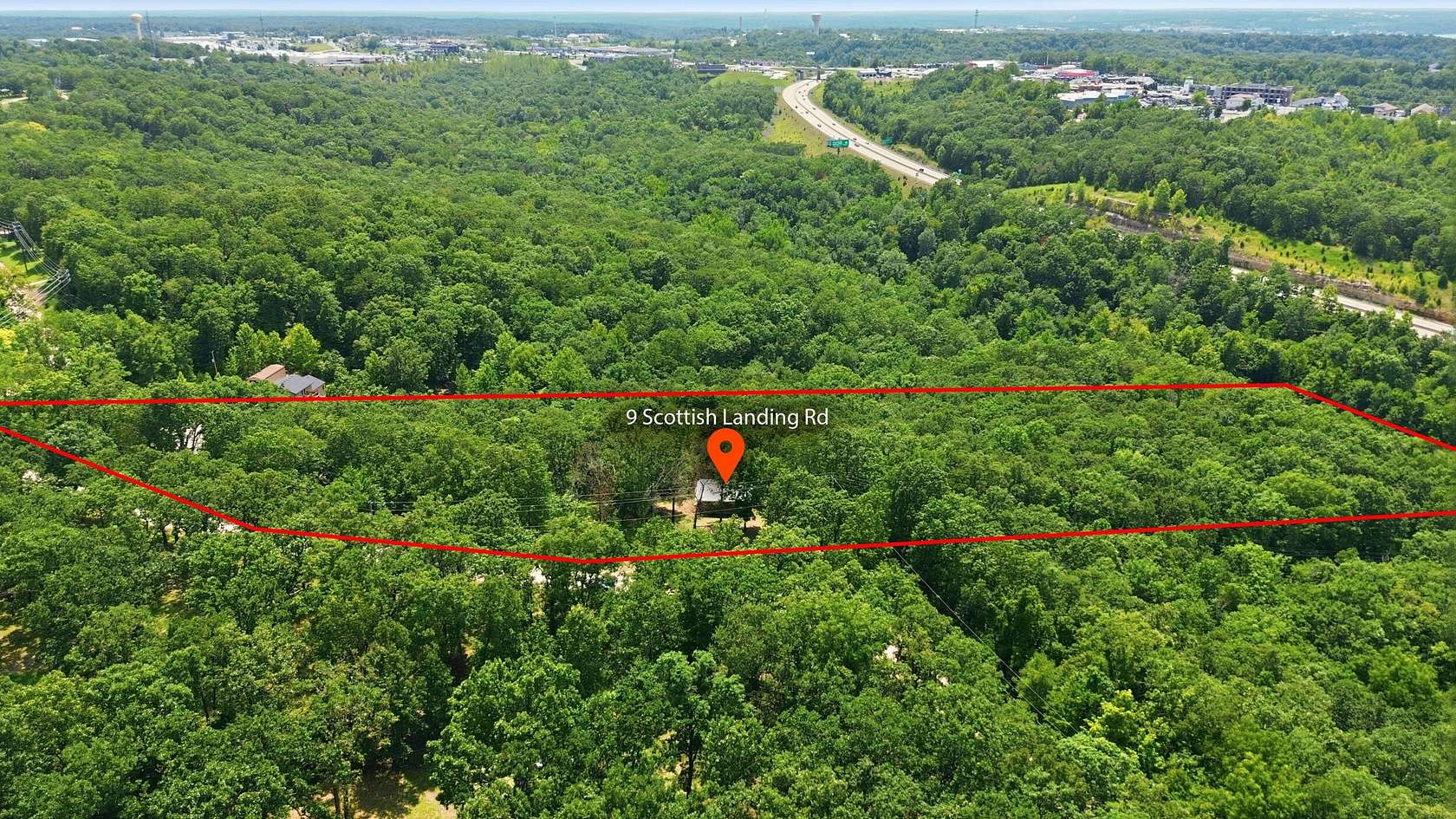 5 Acres of Land with Home for Sale in Lake Ozark, Missouri