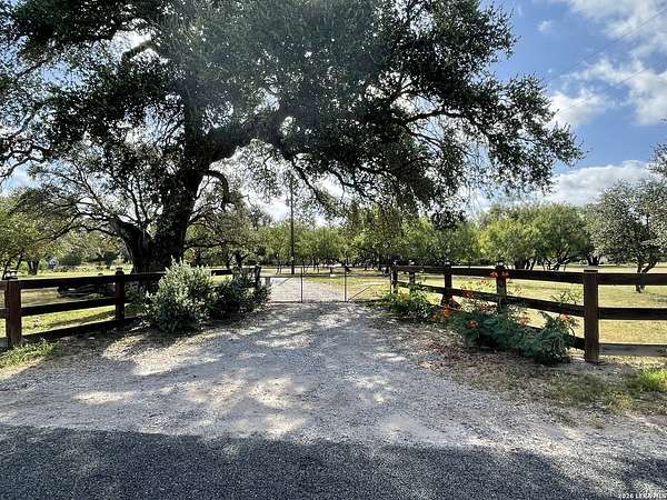 10 Acres of Recreational Land with Home for Sale in Devine, Texas
