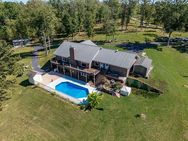37.2 Acres of Land with Home for Sale in Parsons, Tennessee