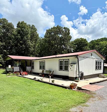 2.85 Acres of Land with Home for Sale in McDonald, Tennessee