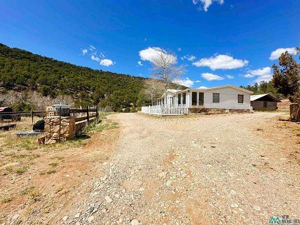 27.2 Acres of Land with Home for Sale in Pecos, New Mexico