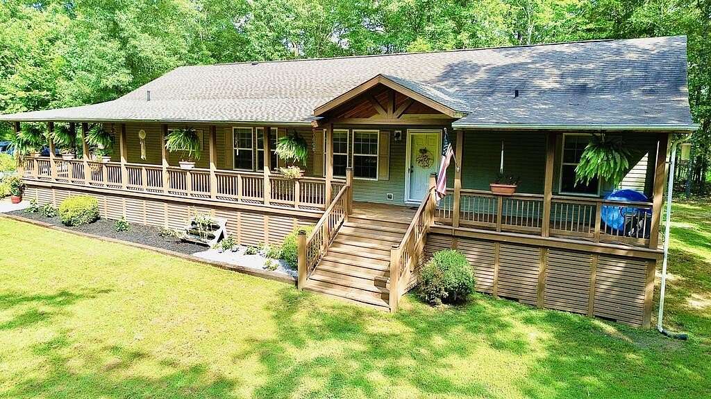 10.5 Acres of Land with Home for Sale in Big Sandy, Tennessee