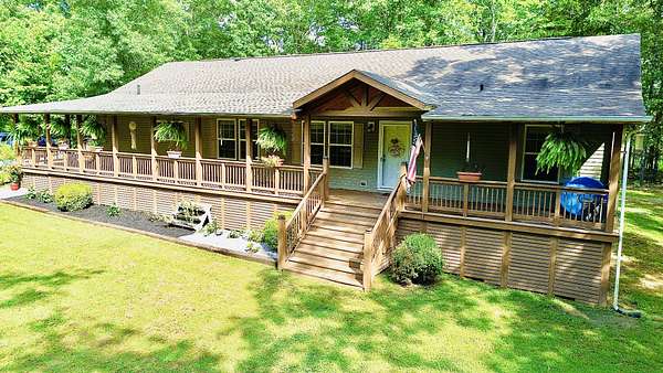 10.5 Acres of Land with Home for Sale in Big Sandy, Tennessee