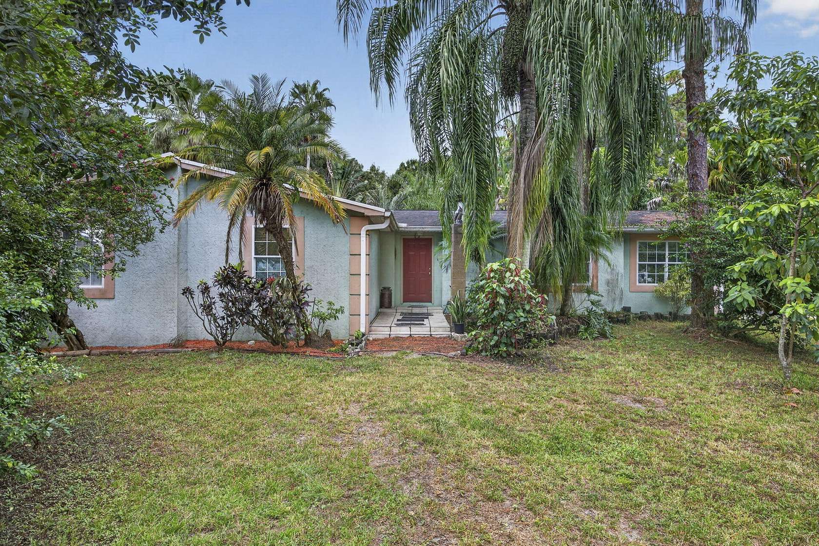 5 Acres of Land with Home for Sale in Loxahatchee Groves, Florida