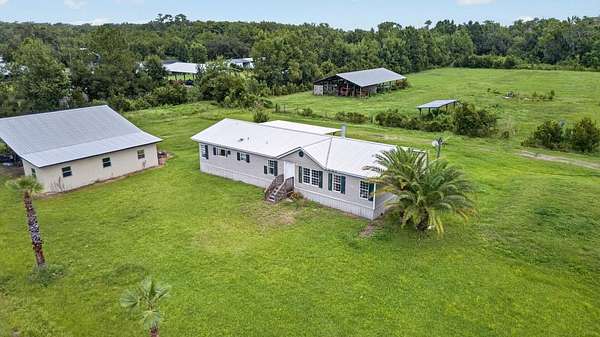 11.6 Acres of Land with Home for Sale in East Palatka, Florida