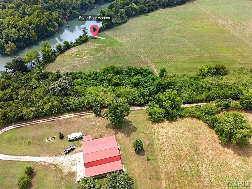 8.19 Acres of Land with Home for Sale in Macks Creek, Missouri
