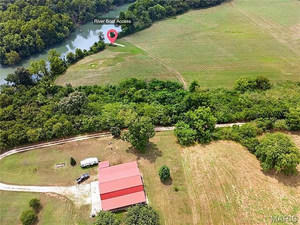 8.19 Acres of Land with Home for Sale in Macks Creek, Missouri