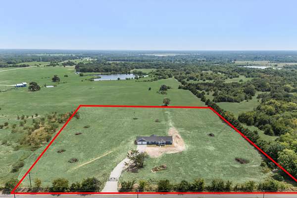 8.89 Acres of Land with Home for Sale in Cumby, Texas