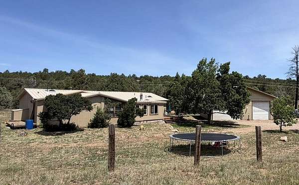 2 Acres of Land with Home for Sale in Tijeras, New Mexico