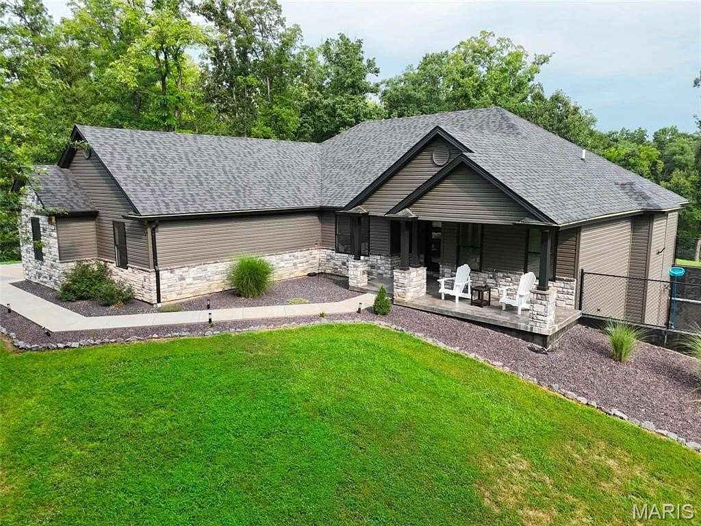 12.4 Acres of Land with Home for Sale in Hannibal, Missouri
