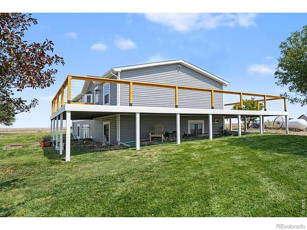 9.69 Acres of Land with Home for Sale in Briggsdale, Colorado