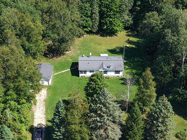 38.6 Acres of Recreational Land with Home for Sale in Port Hope, Michigan