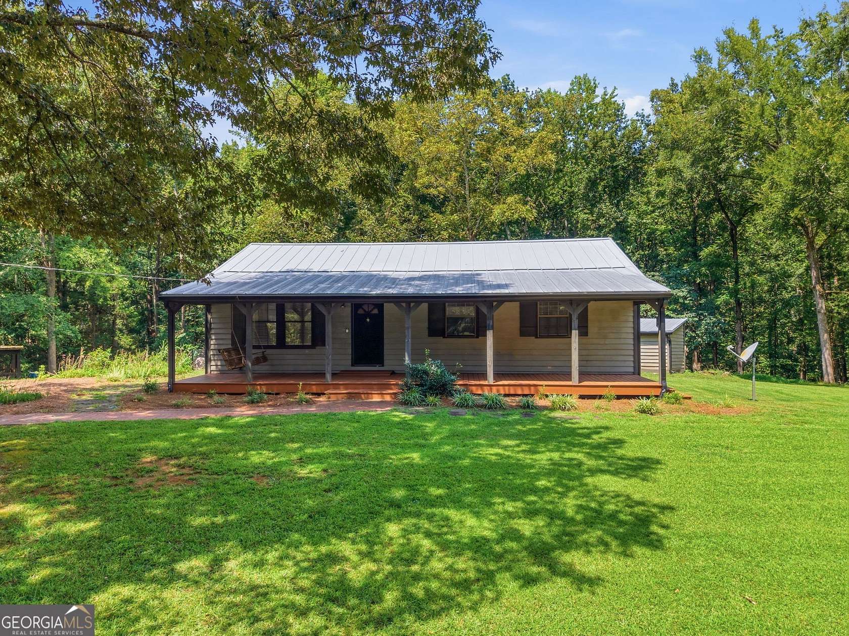 3.66 Acres of Land with Home for Sale in Arnoldsville, Georgia