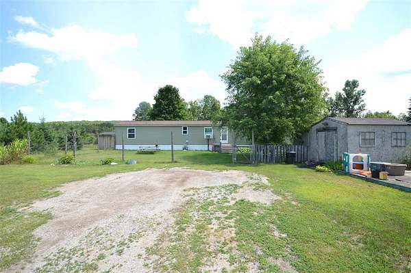 2 Acres of Land with Home for Sale in Wolverine, Michigan