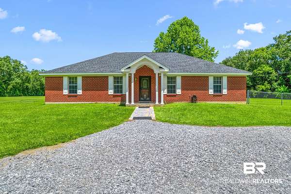 9.8 Acres of Land with Home for Sale in Silverhill, Alabama