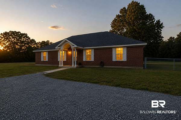 9.8 Acres of Land with Home for Sale in Silverhill, Alabama