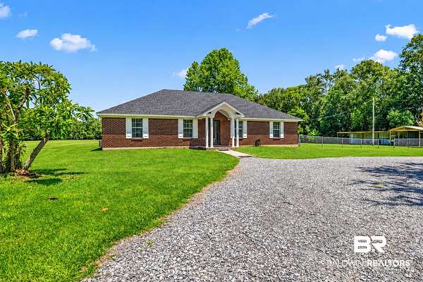 9.8 Acres of Land with Home for Sale in Silverhill, Alabama