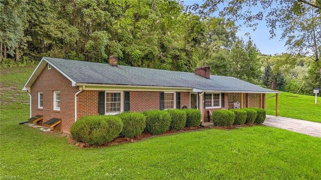 2.3 Acres of Land with Home for Sale in Millers Creek, North Carolina