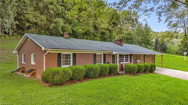 2.3 Acres of Land with Home for Sale in Millers Creek, North Carolina