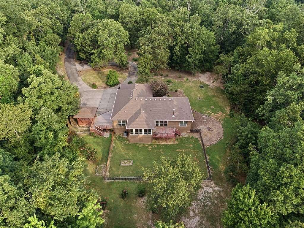 6.77 Acres of Land with Home for Sale in Bella Vista, Arkansas