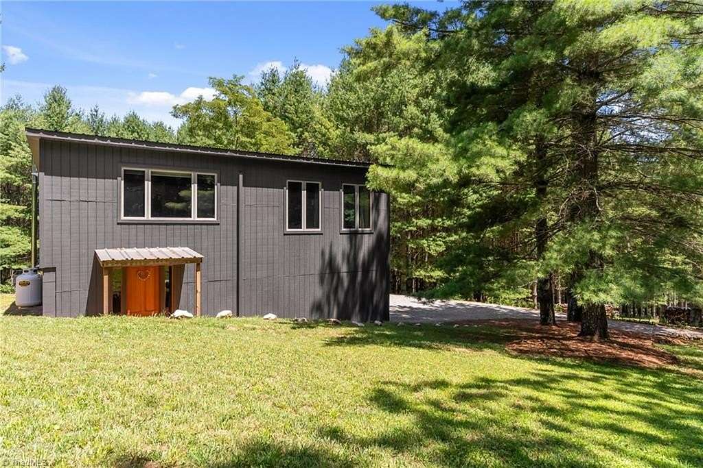 8.2 Acres of Land with Home for Sale in Sparta, North Carolina