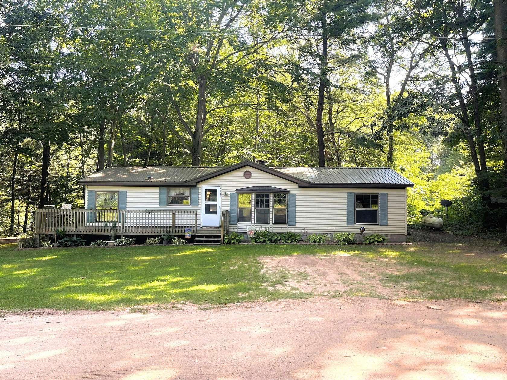 4.74 Acres of Land with Home for Sale in Holton, Michigan