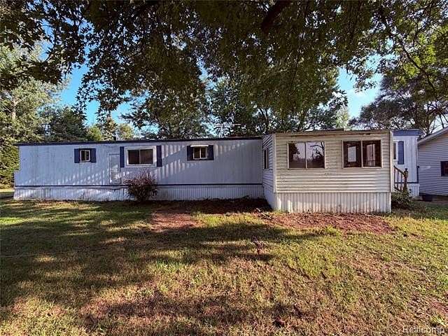 2 Acres of Land with Home for Sale in Novesta Township, Michigan