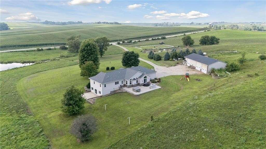39 Acres of Agricultural Land with Home for Sale in Swisher, Iowa