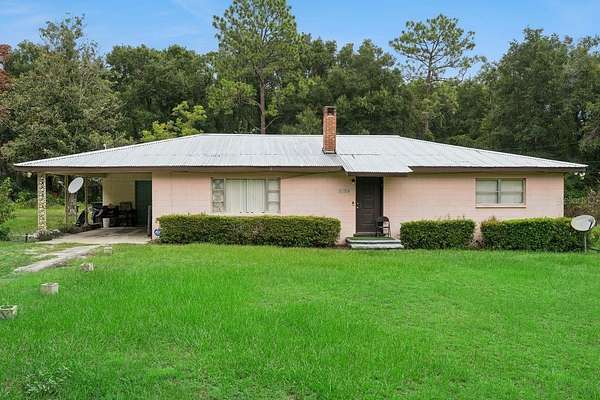 7.3 Acres of Land with Home for Sale in Wildwood, Florida