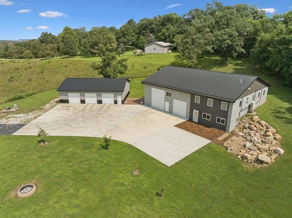 28.4 Acres of Recreational Land with Home for Sale in Center Point, Iowa