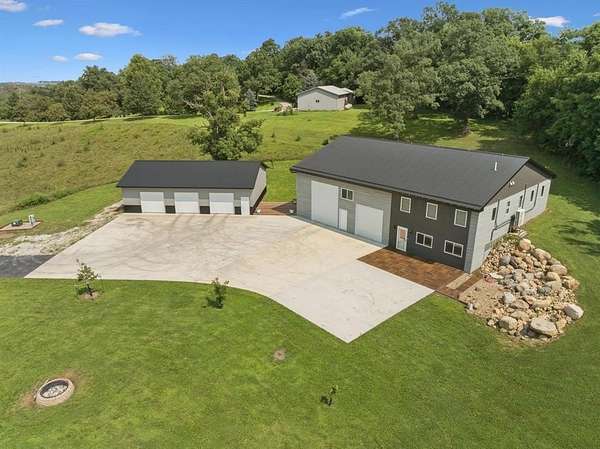 28.4 Acres of Recreational Land with Home for Sale in Center Point, Iowa