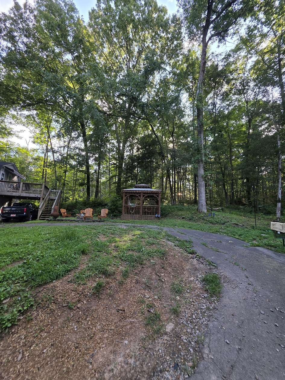 3.8 Acres of Land with Home for Sale in Cunningham, Tennessee