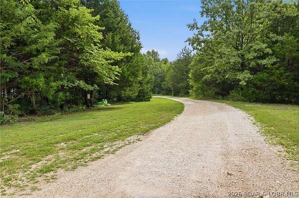 40 Acres of Recreational Land with Home for Sale in Camdenton, Missouri