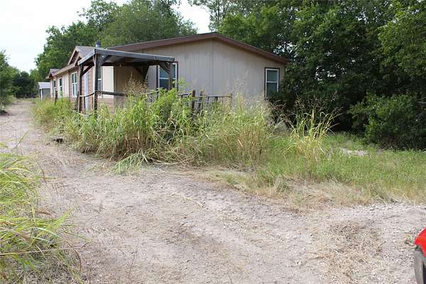 5.67 Acres of Land with Home for Sale in Crandall, Texas