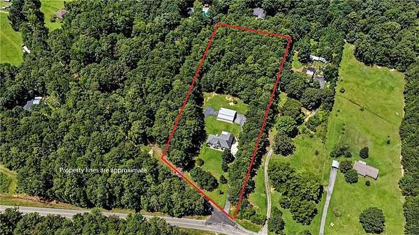3.3 Acres of Land with Home for Sale in McDonough, Georgia