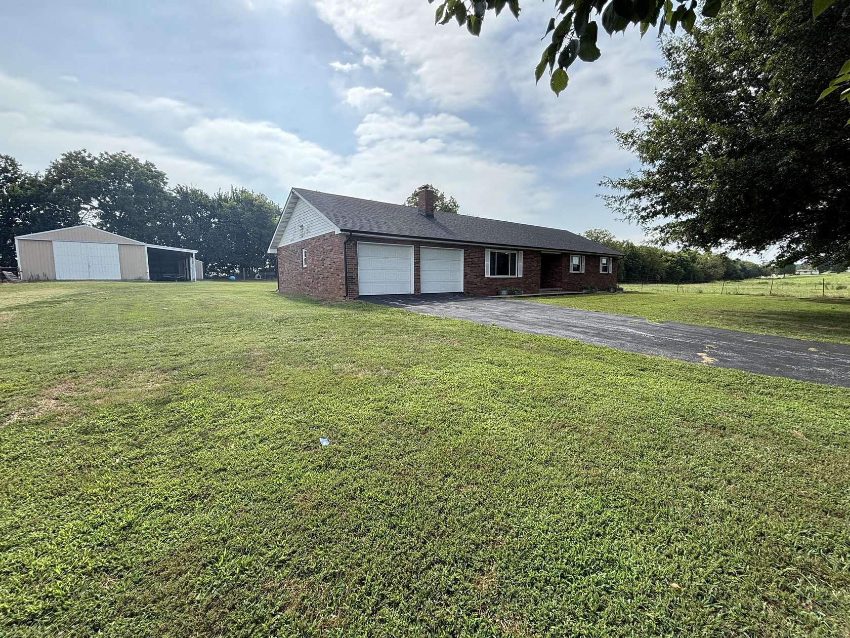 11.8 Acres of Land with Home for Sale in Aurora, Missouri
